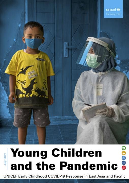 boy wearing mask with health worker
